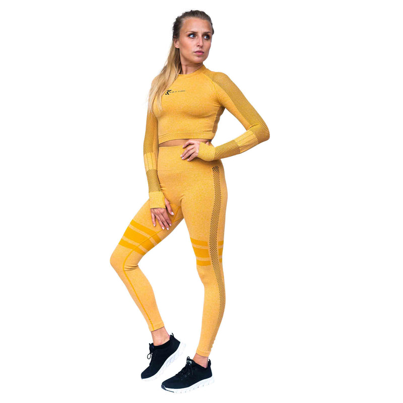 MOTION Two-Piece Women’s Workout Set: Long-Sleeve High Neck Crop Top and Leggings - GOLDEN